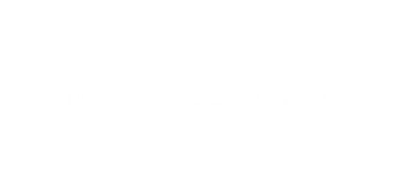 Scale With Video Logo with the text "Aubrey Marcus" in capital letters and a stylized "A" at the center, ideal for business owners looking to scale with video content creation in Texas. Texas